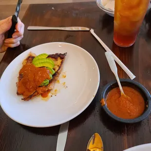 Chicken breast with fresh avocado covered in the best salsa you've ever had!