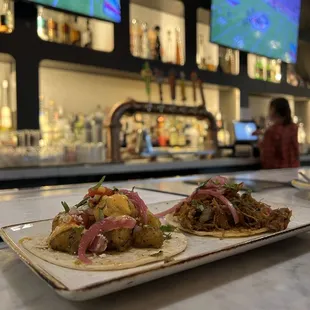 CAULIFLOWER TACO and PORK CARNITAS TACO