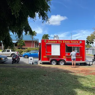 He's usually across from the Outback Steakhouse