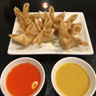 Crab cheese wanton. Sometimes the mustard is just as important as is the sweet sauce. Made in-house.