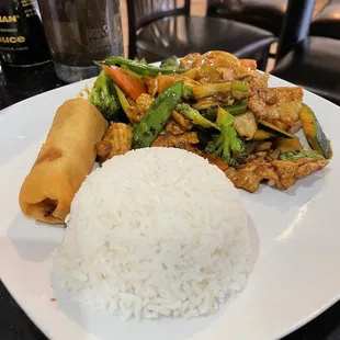 Chicken Schezuan Lunch special - veggie egg roll and rice with some crispy, delicious veggies