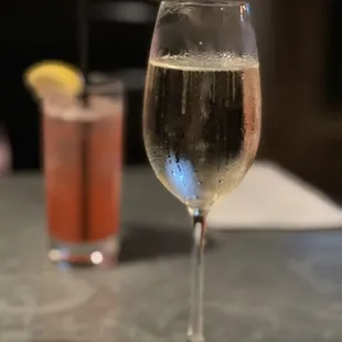Prosecco in the foreground and The Nutty Plumfessor in the background.