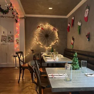 a dining room decorated for christmas