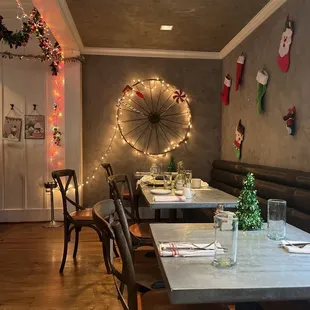 a dining room decorated for christmas
