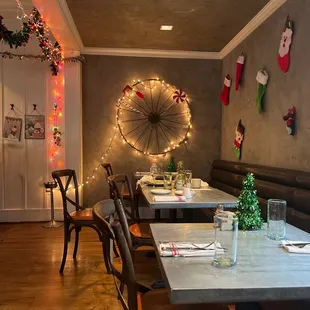 a dining room decorated for christmas