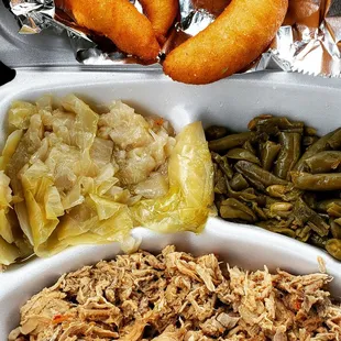 Chopped bbq, green beans, cabbage and hush puppies