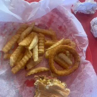 Almost gone joneburger with fries and onion rings