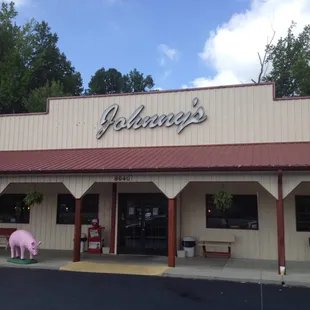 Front entrance, with a pig statute on guard duty