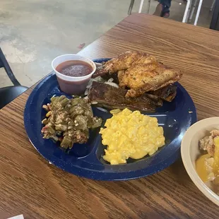 Chicken with pork ribs plate with okra gumbo and mac and cheese. The ribs fall right off the bone!