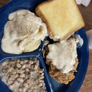 Chicken Fried Steak (real steak), Mashed Potatoes and Blackeyed Peas. Absolutely delicious.
