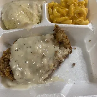 The chicken fried steak that I eat a bite out of was so bland and you can tell that it was heated up and then sold to me to eat
