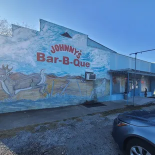 a painted mural on the side of a building