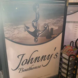 a sign for johnny&apos;s boathouse