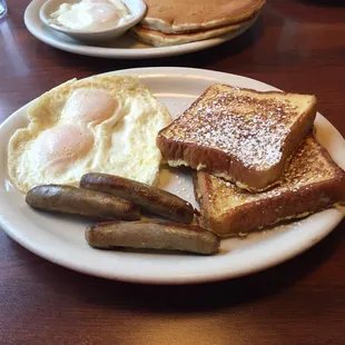 Texas French Toast with eggs over easy, and turkey sausage