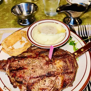 13 ounce ribeye steak medium rare with cowboy mashed potatoes