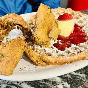 Traditional wings and strawberry waffle