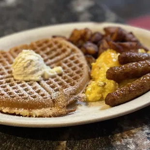 The Fab 4. Waffles Chicken Sausage (2) cheesy Scrambled Eggs (Cheese) garlic Breakfast Potato&apos;s (with garlic)