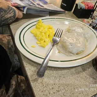 Chicken fried steak and scrambled eggs..sorry..some egg was eaten