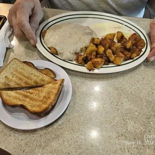 Chicken fried steak, 2 eggs over medium, potatoes and toast