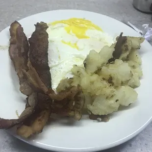 Eggs bacon and potatoes, missing my wheat toast