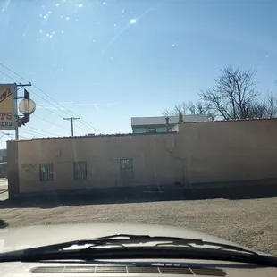 In the parking lot facing South