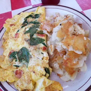 an omelet and potatoes