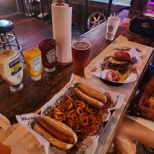 Cheeseburger ($10.65) and Hot dog basket with fries ($11) and Yuengling 20 oz ($4.65).
