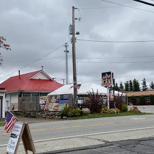 a sign in front of a restaurant