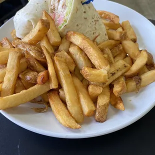 a plate of fries and a sandwich