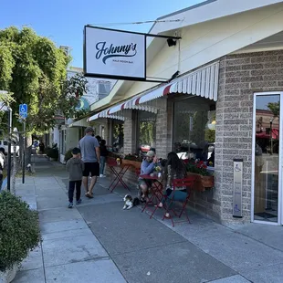 Right on the corner. Some tables outside, with pet friendly seating.