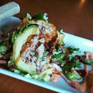 Deep fried avocado with crab fill