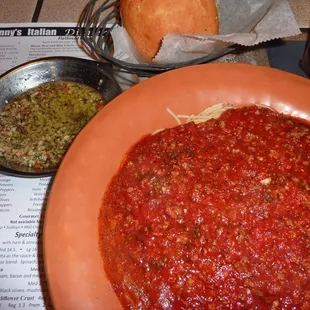Spaghetti with Meat Sauce, warm Bread with Dipping Oil w/Herbs.