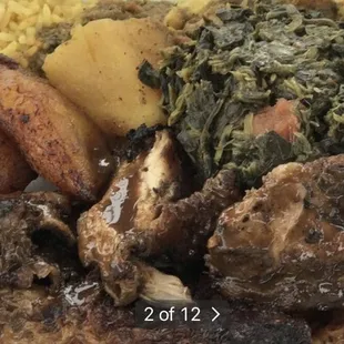 Jerk chicken with rice &amp; peas, greens and fried plantain