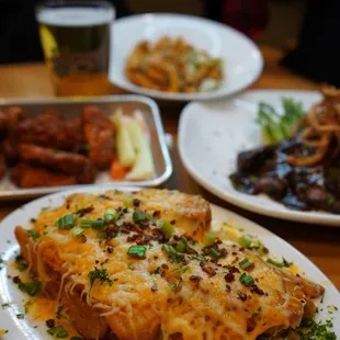 a plate of lasagna and other dishes