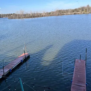 a view of the lake from the deck