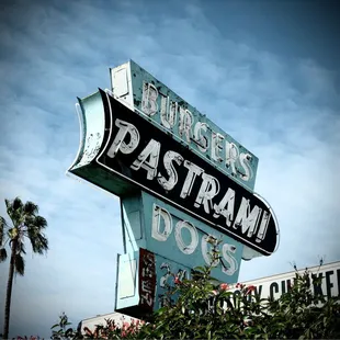 a neon sign for a fast food restaurant