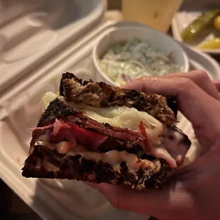 Cross section of the half pastrami sandwich and coleslaw and citrus Thai basil soda!!! OMG EVERYTHING IN THIS PICTURE IS SO WORTH THE $20!!!