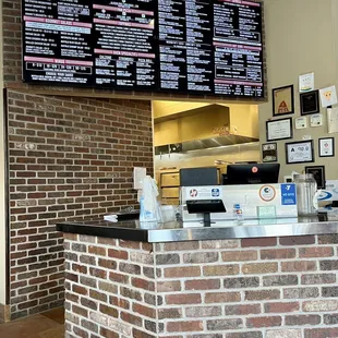 a brick counter and menu