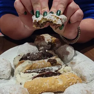 a person holding a donut