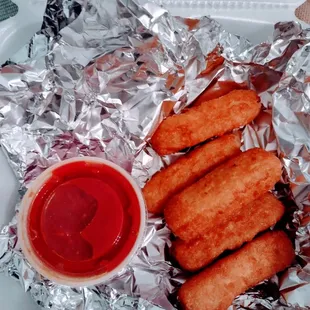 our free appetizer - fried mozzarella sticks and marinara dipping sauce!