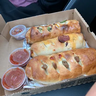 Strobonies- pep/sausage, pep and cheese and combo! Tasted great and priced right. Under ten for each person in our group :)