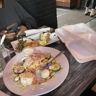 Different angles of food still eating 30 minutes into dining experience.