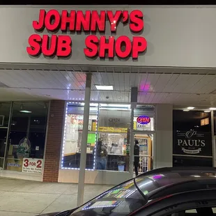 a car parked in front of the store