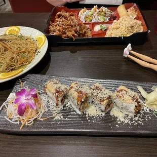 Bento box meal, beef yakisoba and a shrimp roll