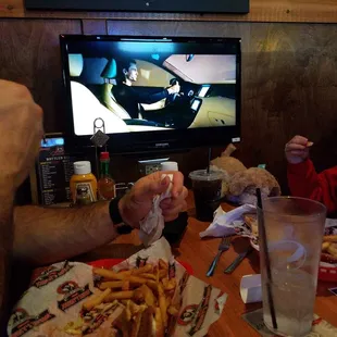 Tvs everywhere even at each table!