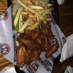 Double dipped wings wet with fries