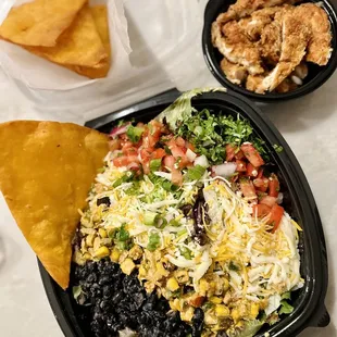 a mexican salad and chips