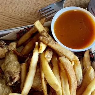 Naked wings, fries and the special Wilson Sauce!