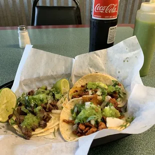 Pastor and bistek tacos with salsa verde