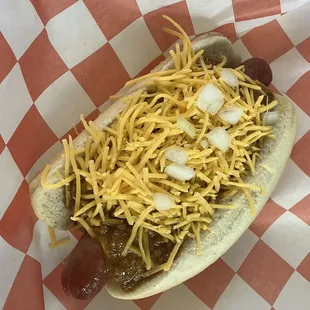 $5.49 Pecan-smoked 100% premium beef hot dog, Chili, cheddar cheese, mustard, onions. Make-it-a-combo with BBQ Beans and a drink. +$3